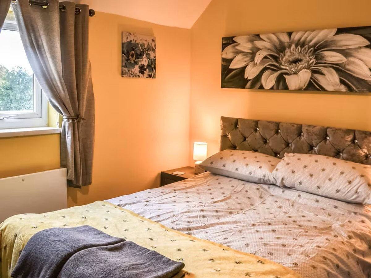 Bedroom inside The Beehive holiday let