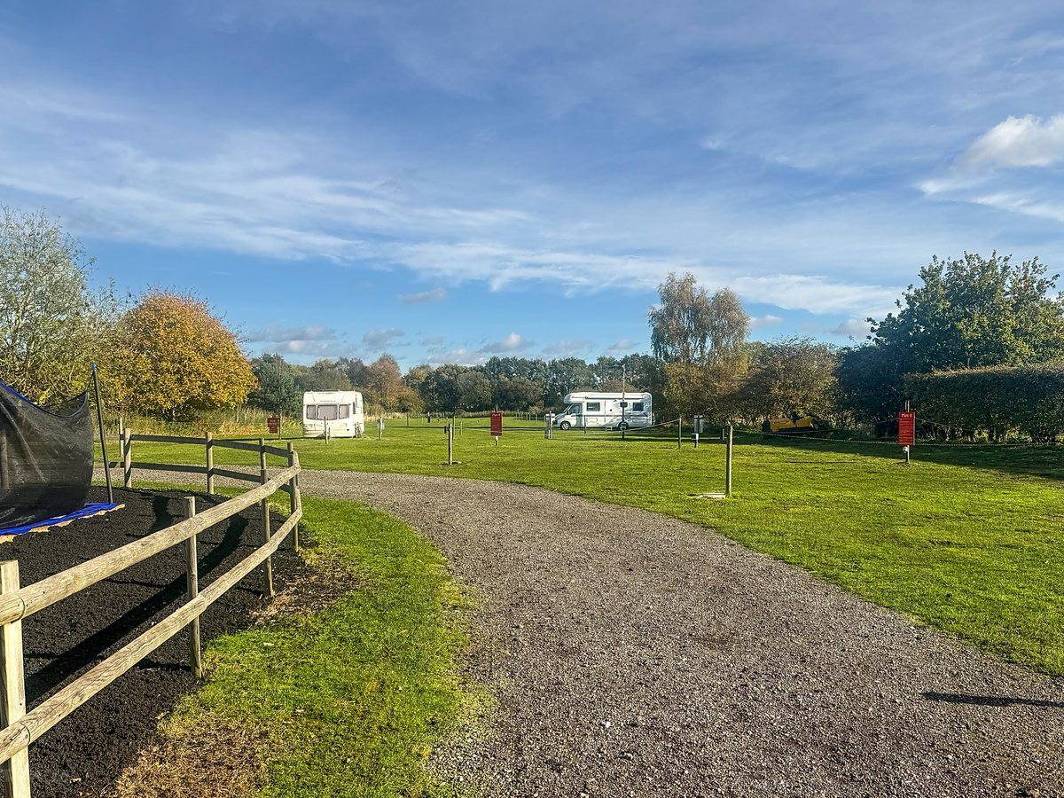 Grass touring pitches at The Red Lion campsite